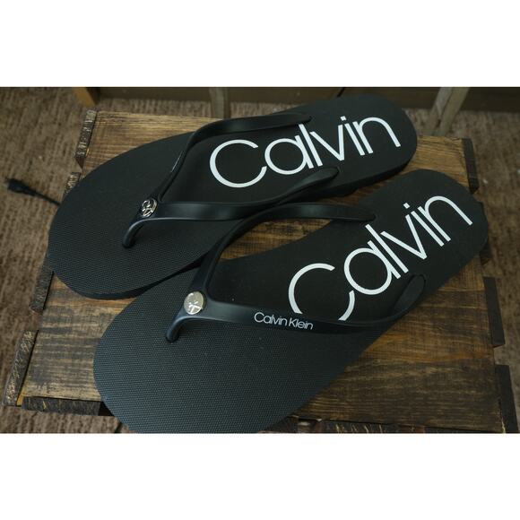 NWOT Calvin Klein Seya Classic Black Thong Flip Flop Logo Detail Womens 11 - Picture 1 of 5